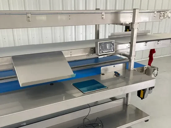 Detailed view of an industrial conveyor belt system used in manufacturing and production settings.